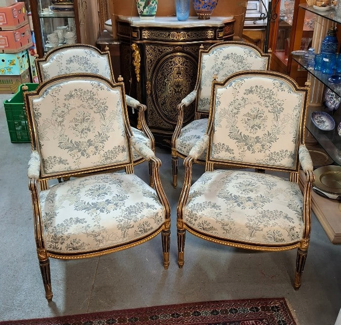 Two pairs of Parisian Louis XVI Armchairs